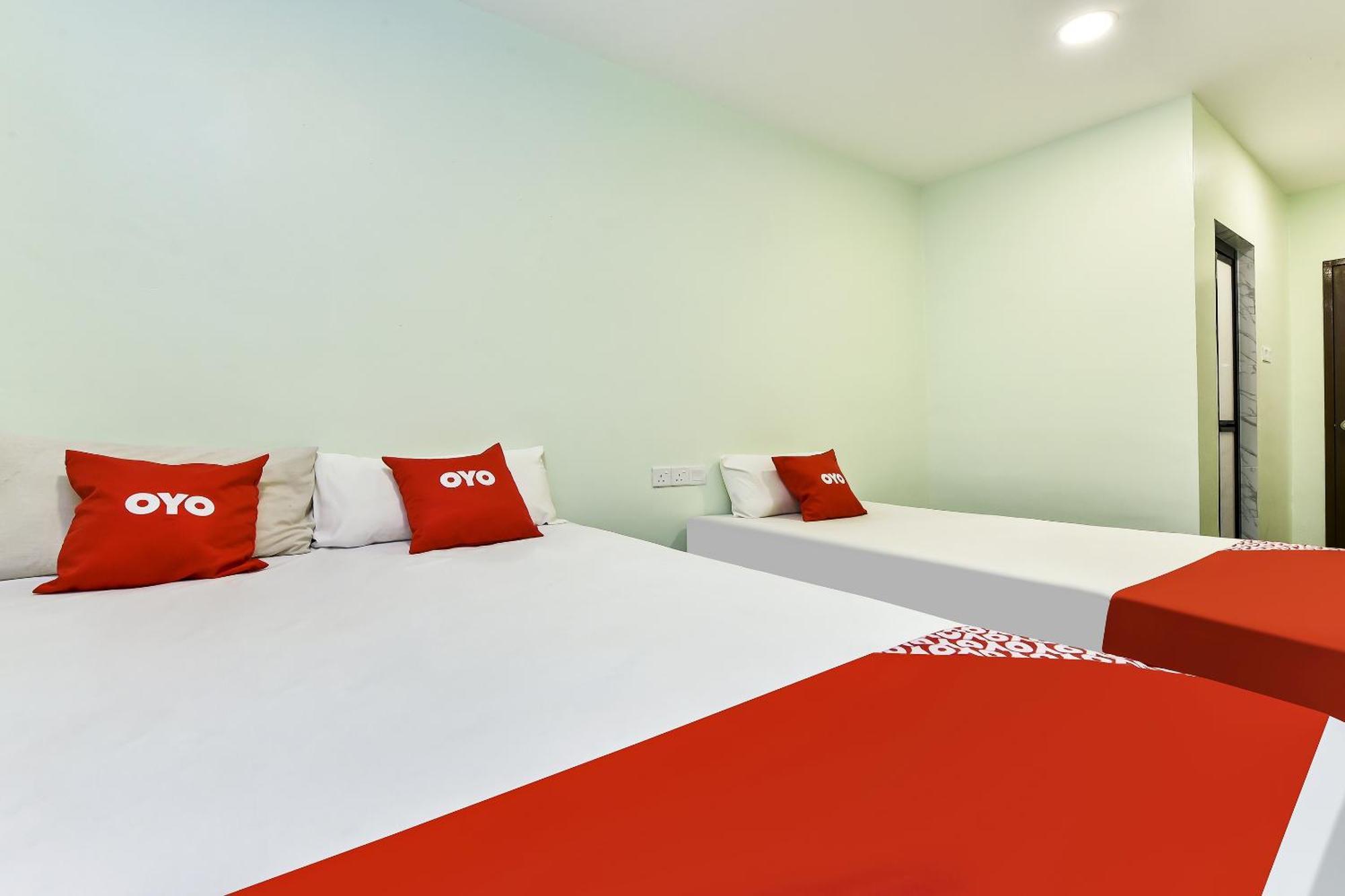 Oyo 90445 Th Hotel Bahau Extérieur photo