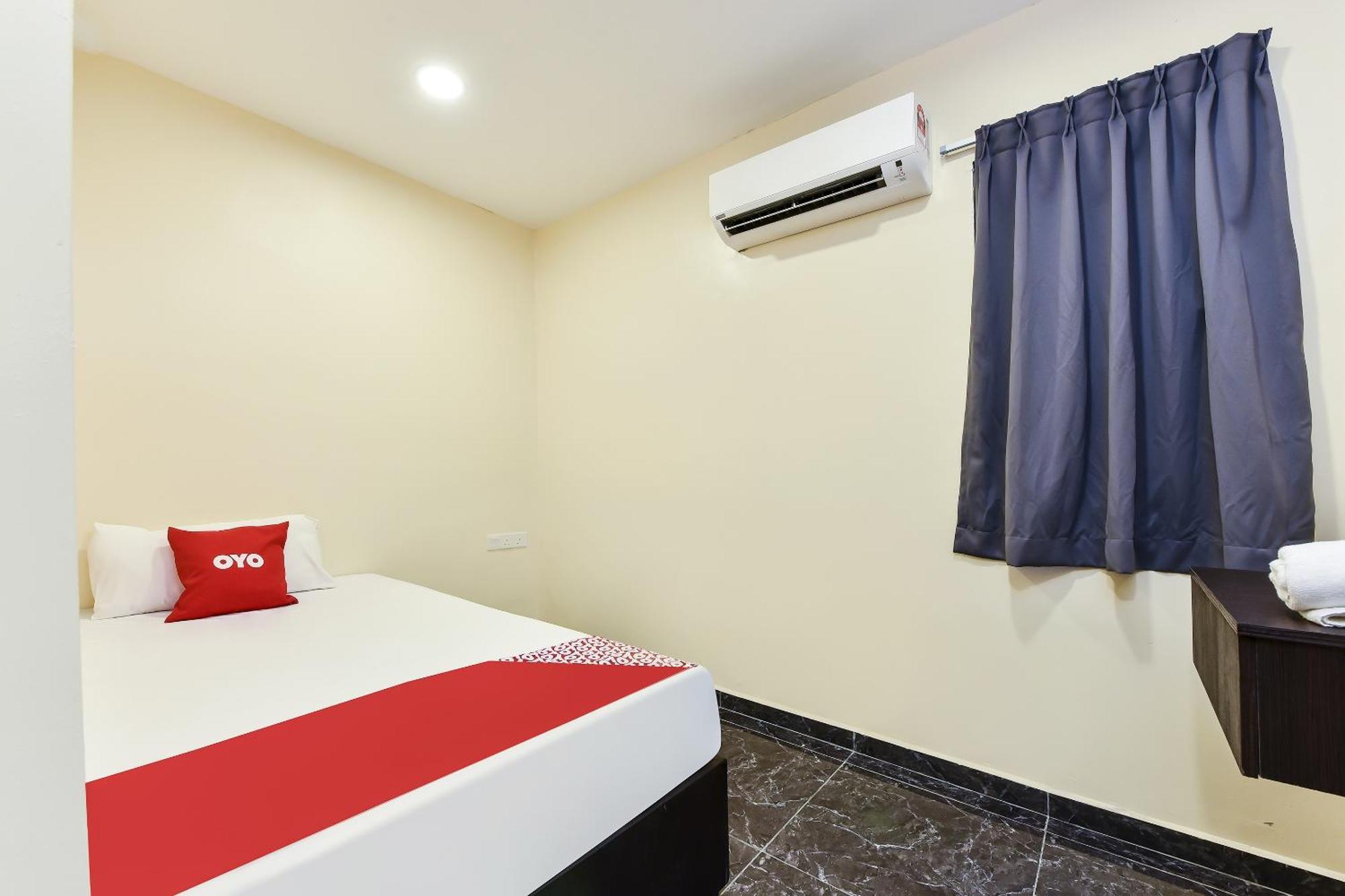 Oyo 90445 Th Hotel Bahau Extérieur photo