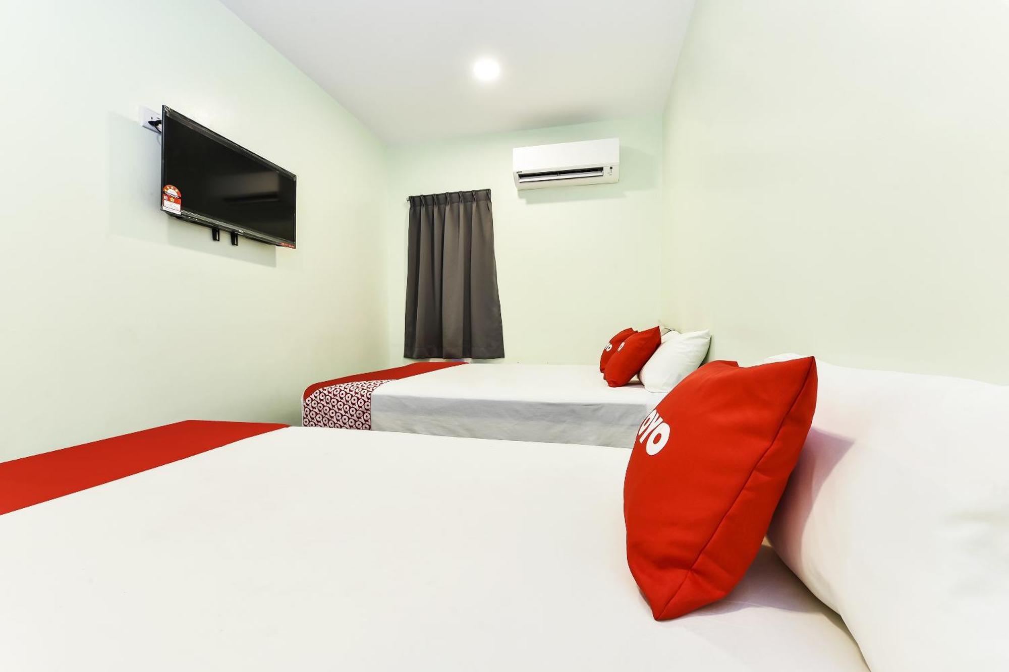 Oyo 90445 Th Hotel Bahau Extérieur photo